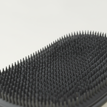 Macro detail of the soft silicone bristle field